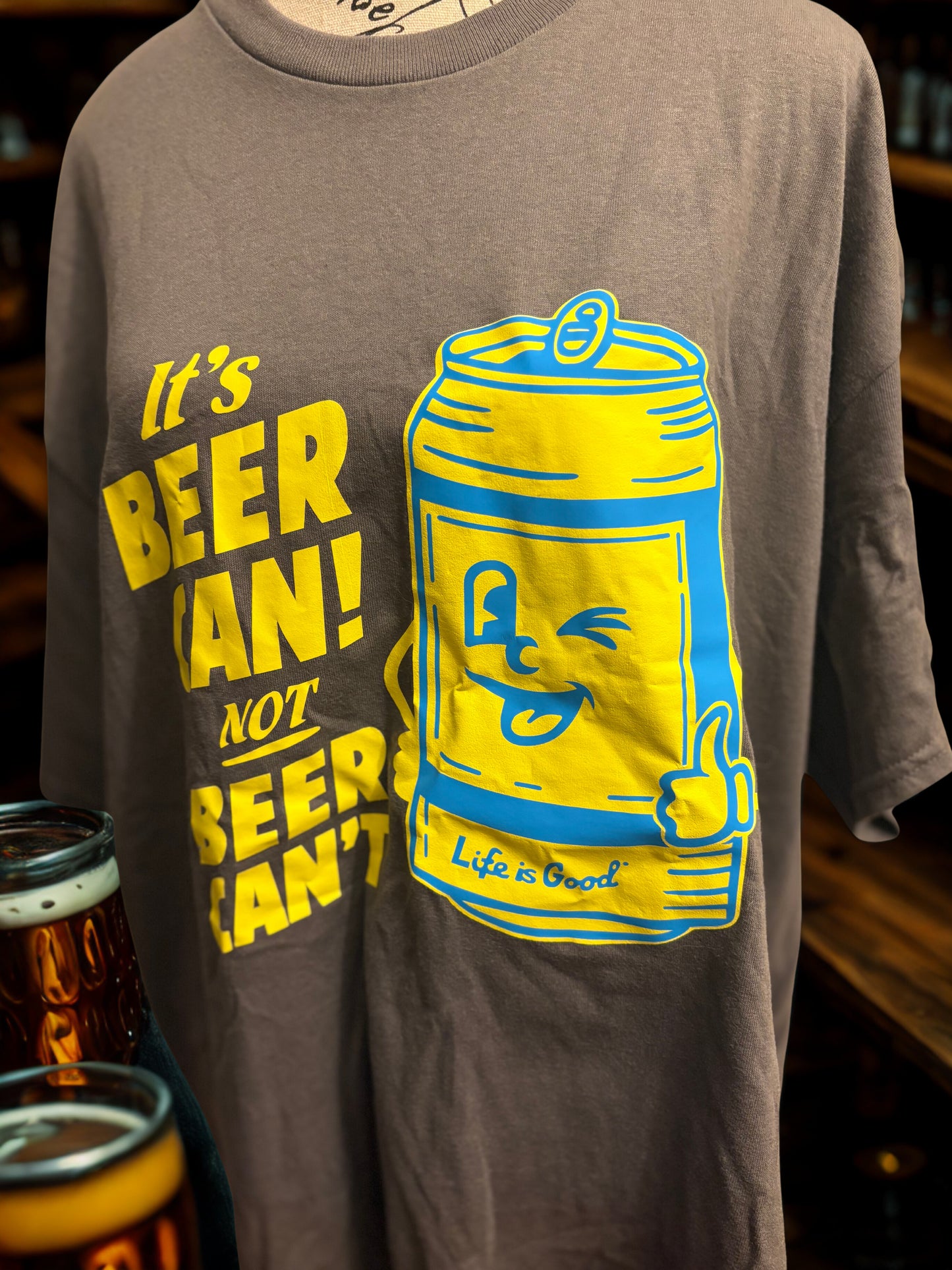 Cheers to Optimism: Brown Tee with Winking Beer Can Fun