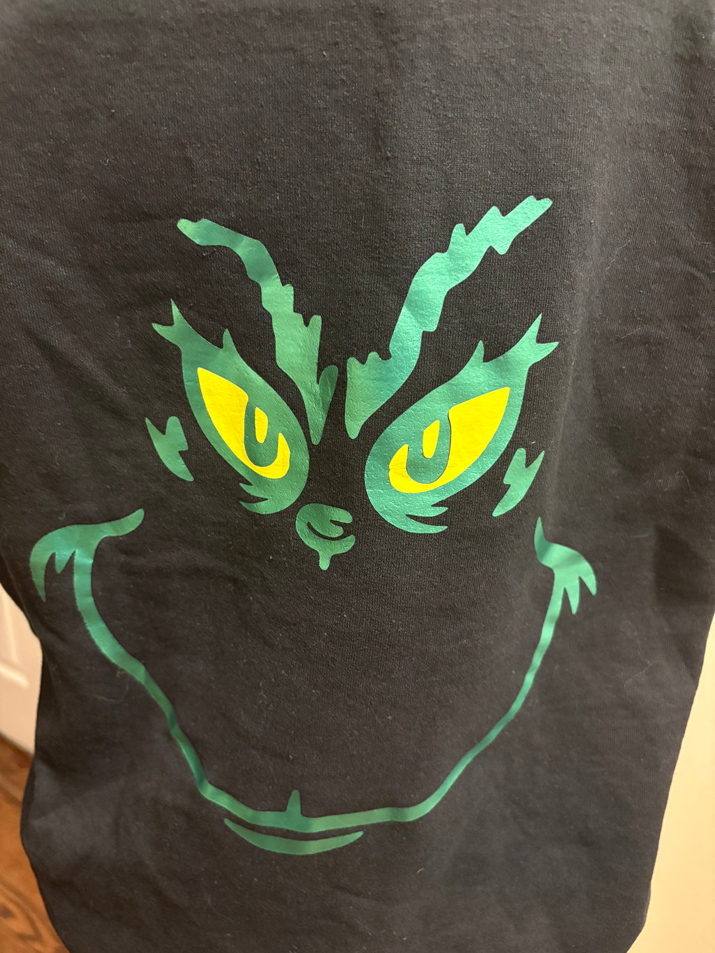Grinchy Greetings: Whoville Welcome Black Hoodie
