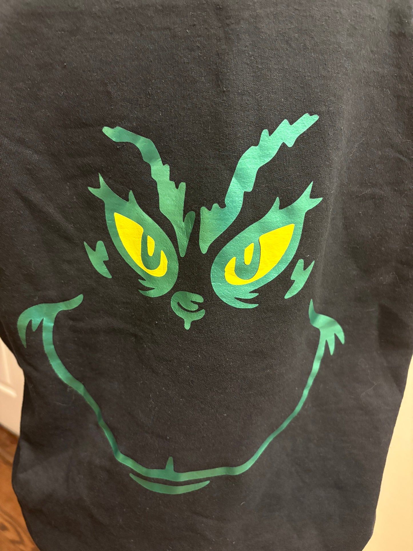 Grinchy Greetings: Whoville Welcome Black Hoodie